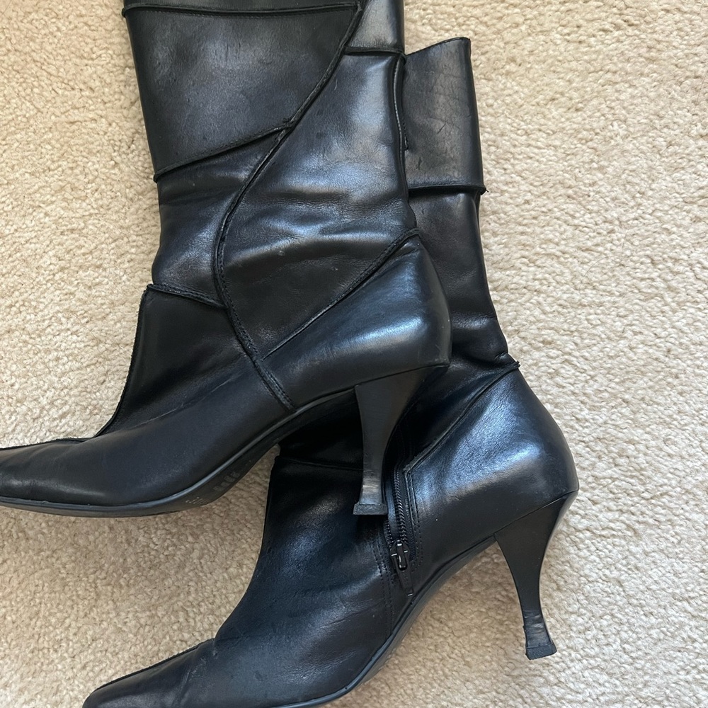 Previously loved black leather boats